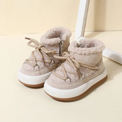 Close-up of non-slip sole on kids' warm winter boots, faux fur lined, toddler size