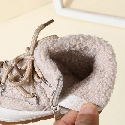 Pair of toddler faux fur winter boots, non-slip, perfect for cold weather, front view