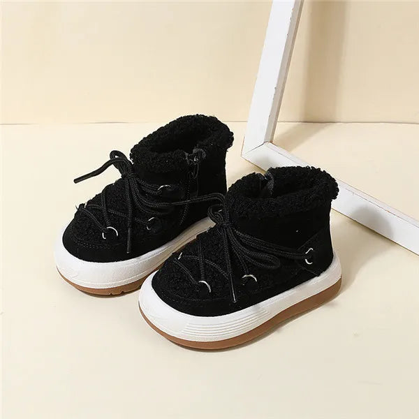 Warm brown kids winter boots with visible faux fur lining, non-slip tread, outdoor shot