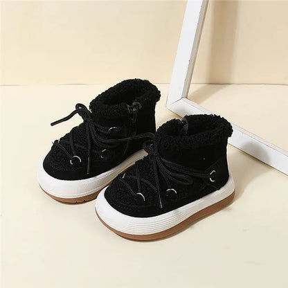 Warm brown kids winter boots with visible faux fur lining, non-slip tread, outdoor shot