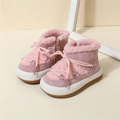 Faux fur interior of kids' winter boots, showcasing warmth and comfort, non-slip soles
