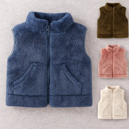 Close-up of blue reversible fleece vest, soft warm toddler outerwear, childrenswear