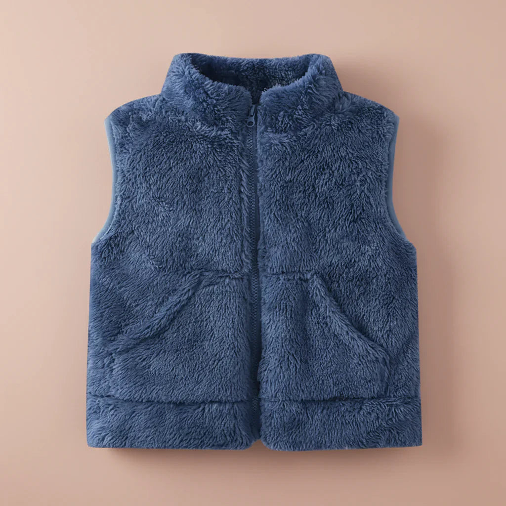 Folded reversible fleece vest, compact warm toddler outerwear for travel, soft childrenswear