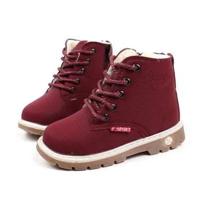 Toddler winter boots in a snowy environment, demonstrating their protective features