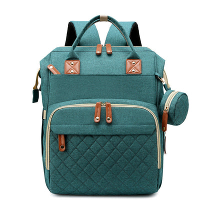 Foldable diaper bag & portable crib in one, perfect for travel & quick naps. Baby essentials.