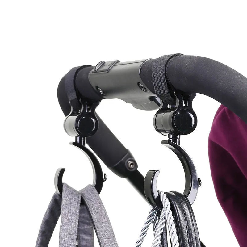 Pair of durable stroller hooks, essential baby gear for hands-free parenting with any pram.