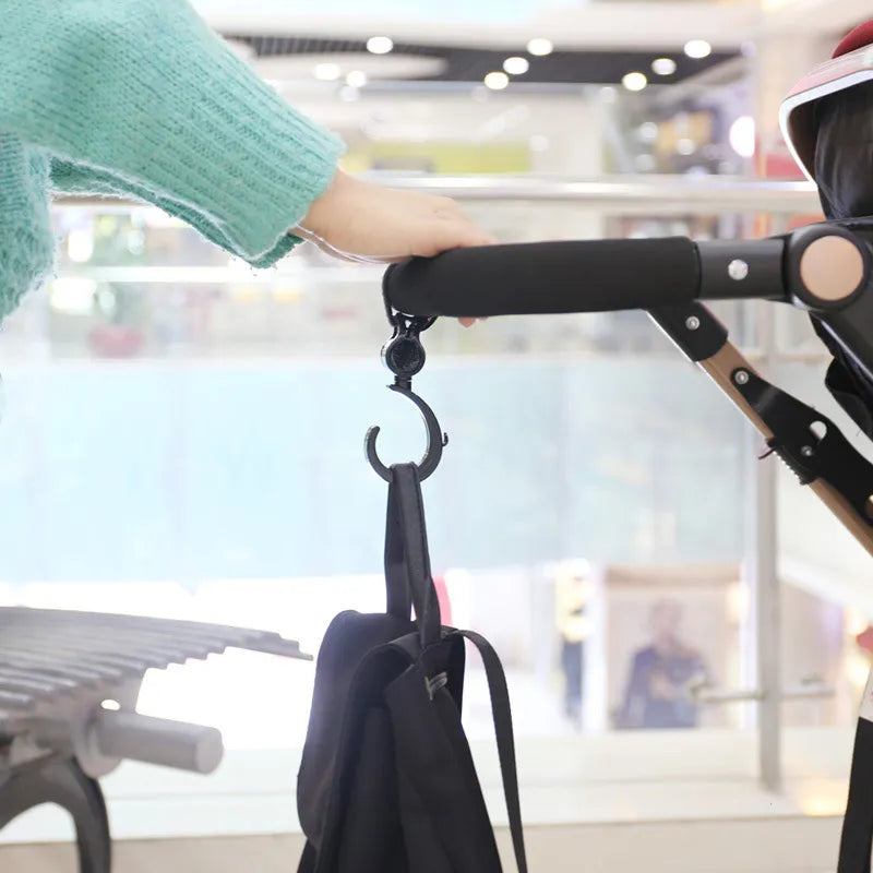 Universal stroller hooks for diaper bags, shopping bags, and purses, a parenting essential.