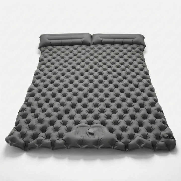 Portable two-person sleeping pad, perfect air mattress for outdoor camping, hiking, and adventure recreation.