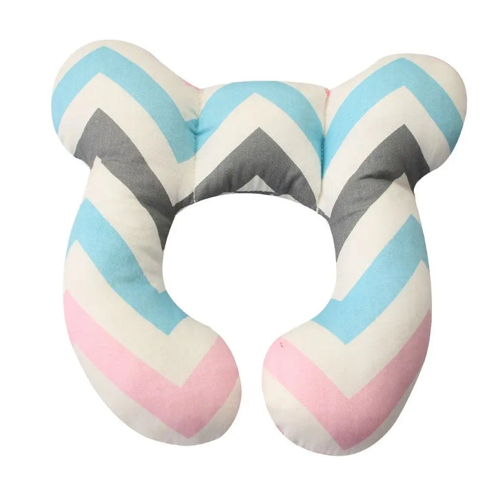 Side view of a U-shaped baby head and neck support pillow, highlighting its ergonomic shape for secure car seat use