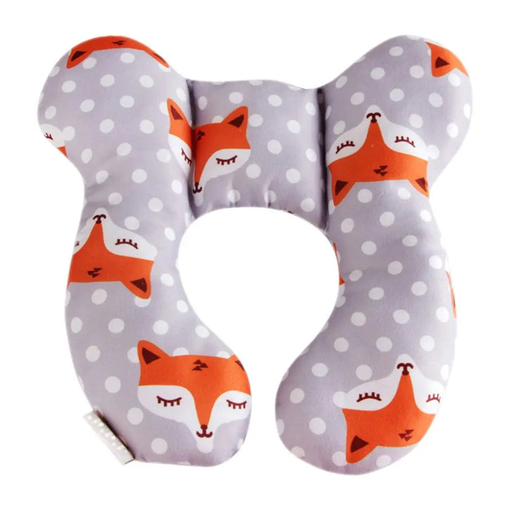Detail of the soft, breathable fabric of a U-shaped baby head support pillow, ideal for car seats and everyday use