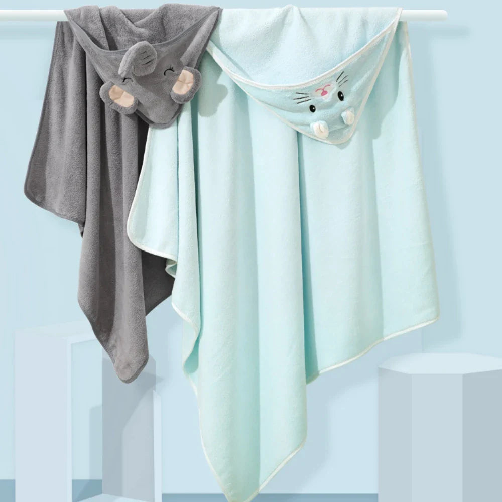 Coral fleece baby blanket with hood, perfect for cozy post-bath snuggles for infants.