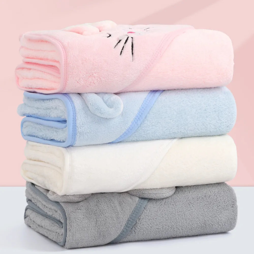 Bath time essential: coral fleece baby hooded towel, super absorbent and plush.