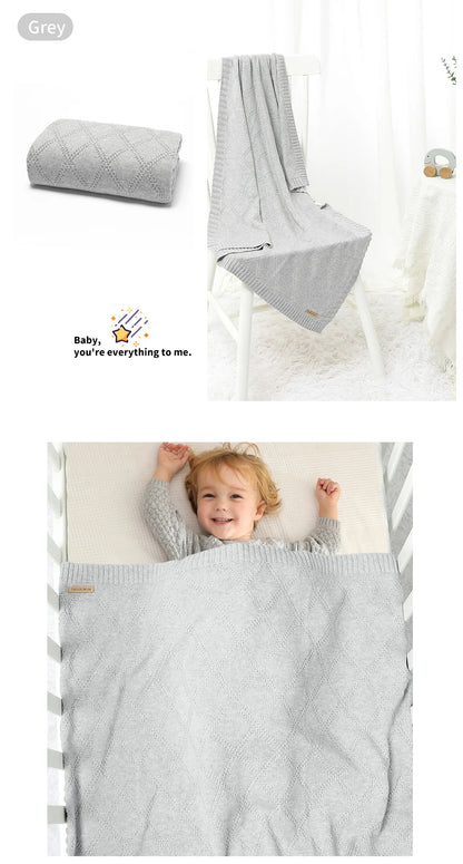 Stylish cotton swaddle blanket with chevron pattern, adding a touch of modern nursery decor