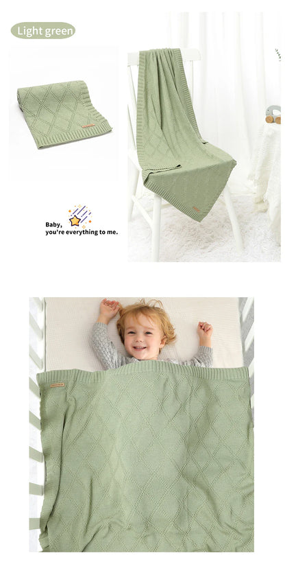 Gift set of a cotton baby swaddle and matching beanie, perfect for newborn celebrations