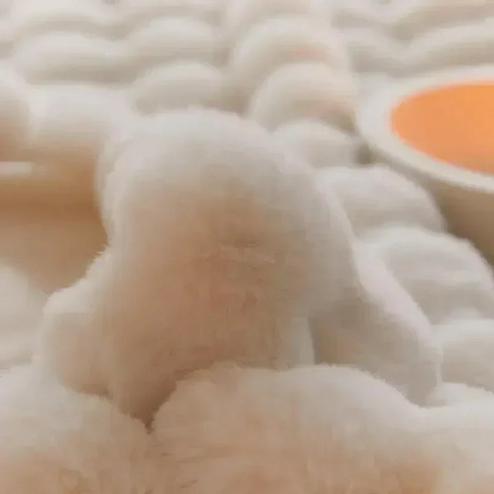 Compact & portable faux fur cuddle throw blanket. Ultra soft, warm, and cozy in beige & white, great for travel.