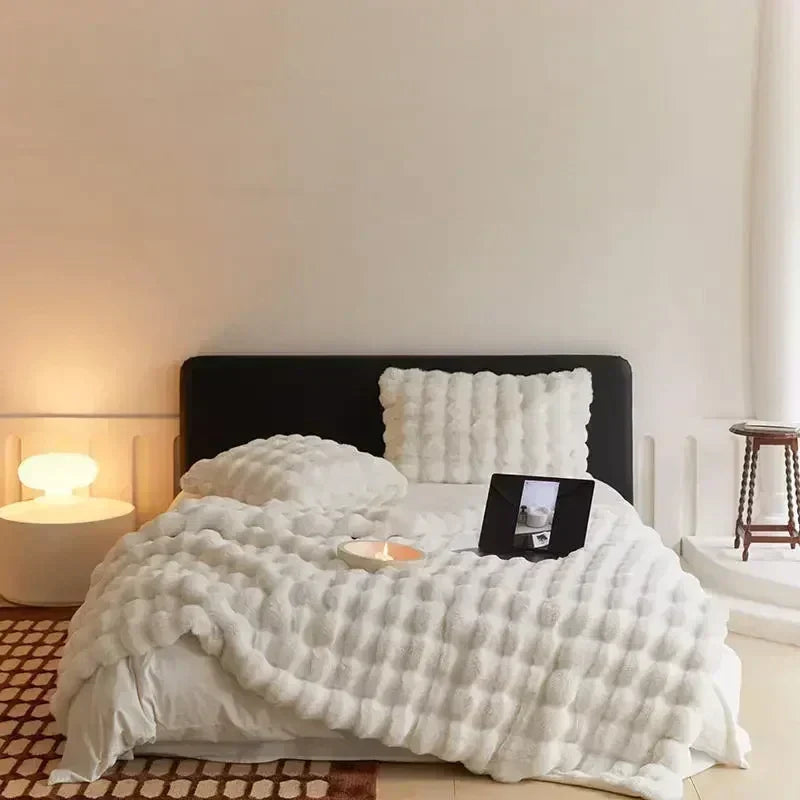 Luxury ultra-soft faux fur throw blanket. Beige & white cozy textile, great for home decor or a warm gift.
