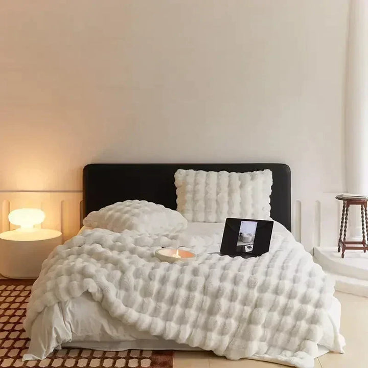 Luxury ultra-soft faux fur throw blanket. Beige & white cozy textile, great for home decor or a warm gift.