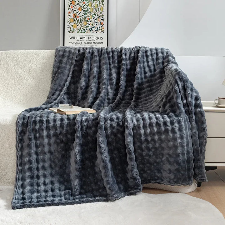 Velvety soft plush home blanket, an ultra-soft flannel throw offering cozy comfort and warmth for any room.