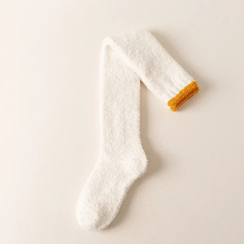 Women's fuzzy knee high socks, perfect for winter warmth & fall fashion. Super soft & comfortable loungewear.