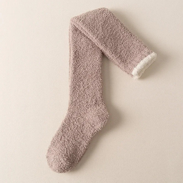 Cozy ultra-soft fuzzy knee high socks for women, offering warm comfort. Ideal loungewear & winter socks.