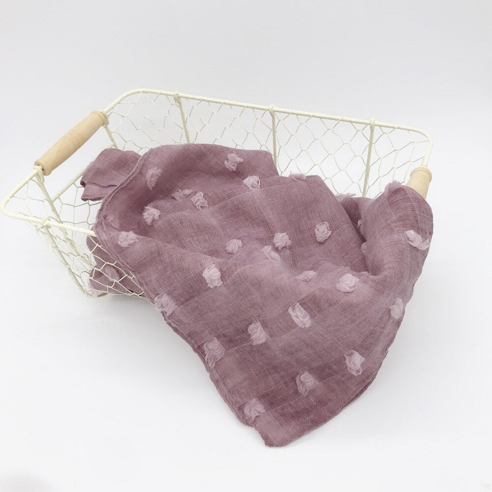 Multi-use baby swaddle blanket: soft cotton infant wrap, car seat cover & stroller blanket for cozy baby comfort.