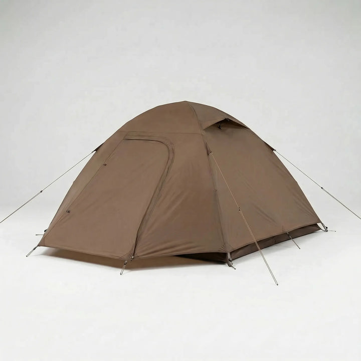 Compact 1-person ultralight dome tent set up at a scenic mountain campsite. Perfect for backpacking & hiking.