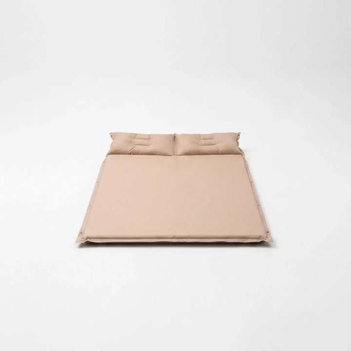Compact, ultralight self-inflating camping pad. Ideal portable sleeping mat for hiking and outdoor adventures.
