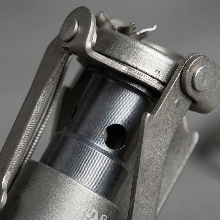Durable ultralight titanium pocket stove. Foldable gas stove for camping, hiking, and portable outdoor cooking.