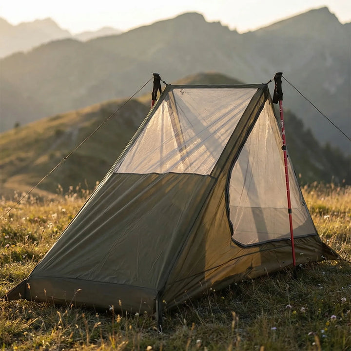 Ultralight single-person mesh tent for backpacking & hiking. Uses trekking poles, provides bug net protection.