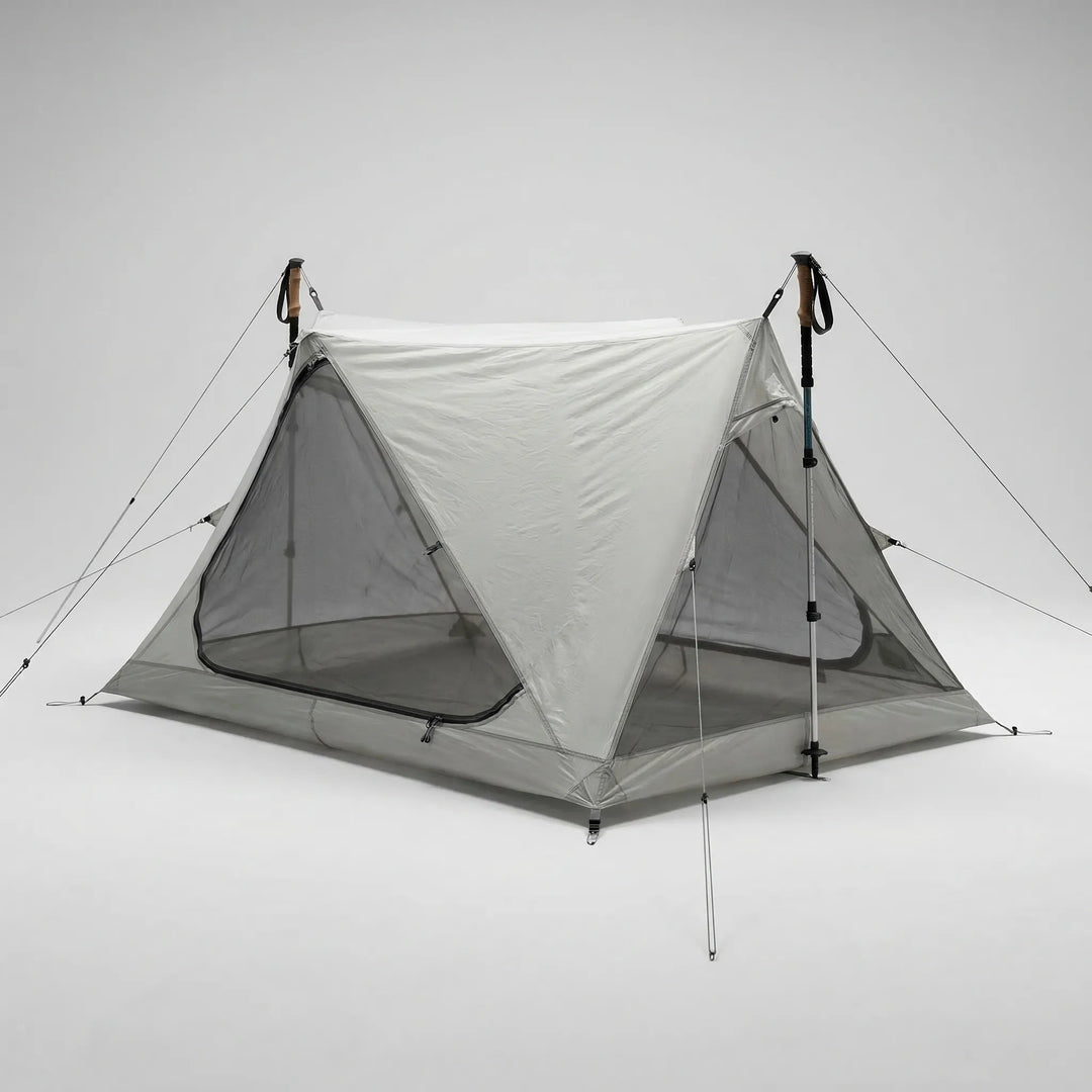 Compact, ultralight single-person mesh tent for backpacking. Sets up with trekking poles, perfect solo bug shelter.