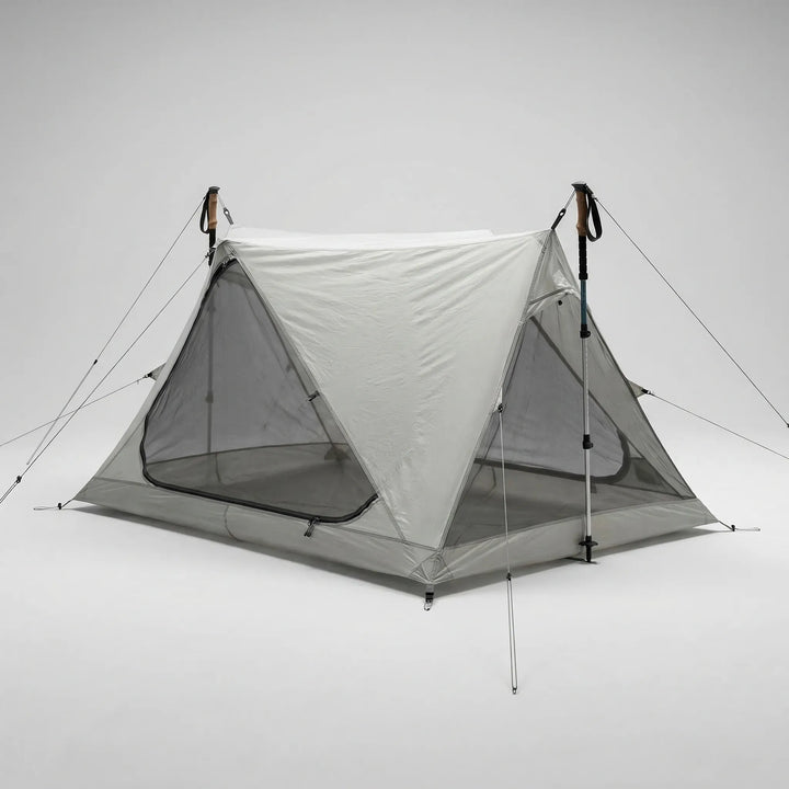 Compact, ultralight single-person mesh tent for backpacking. Sets up with trekking poles, perfect solo bug shelter.