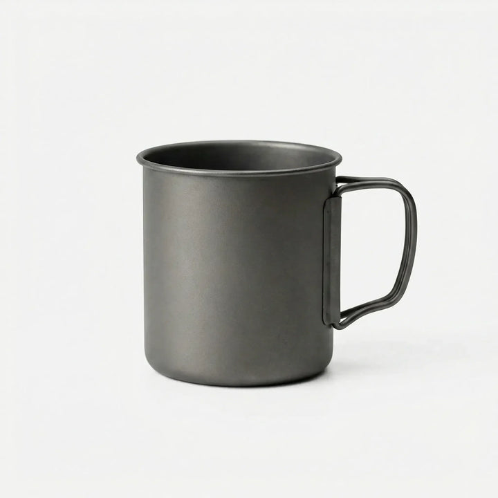 Portable ultralight camping mug with foldable handle for hiking, travel, and outdoor adventures.