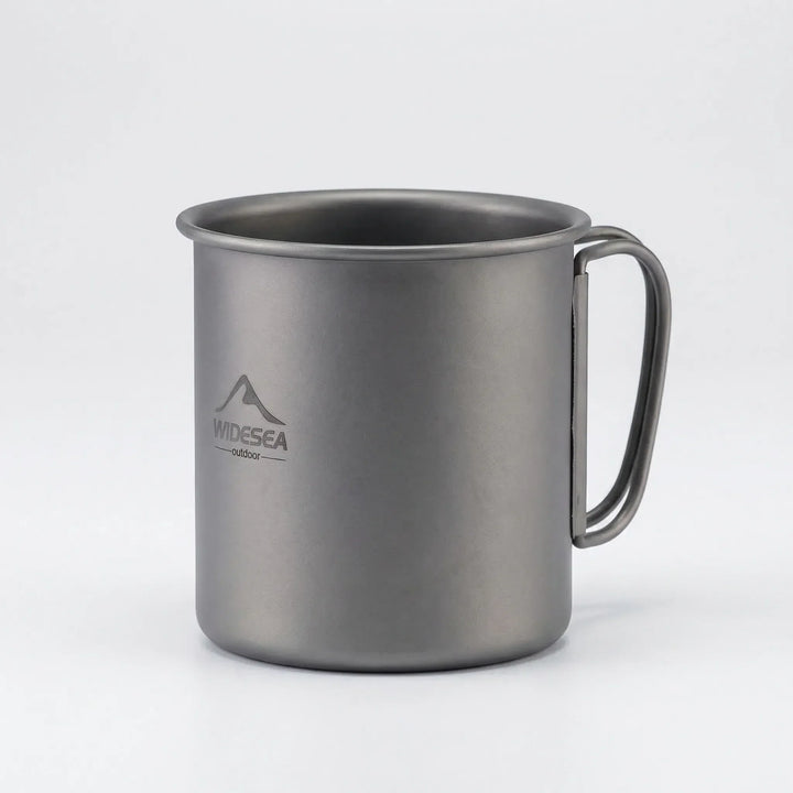 Durable ultralight titanium camping mug, space-saving with a foldable handle for efficient packing.