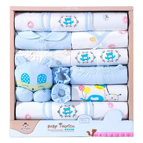 Assorted infant cotton clothing items (0-3M): pants, tops, bib, booties featuring pattern print