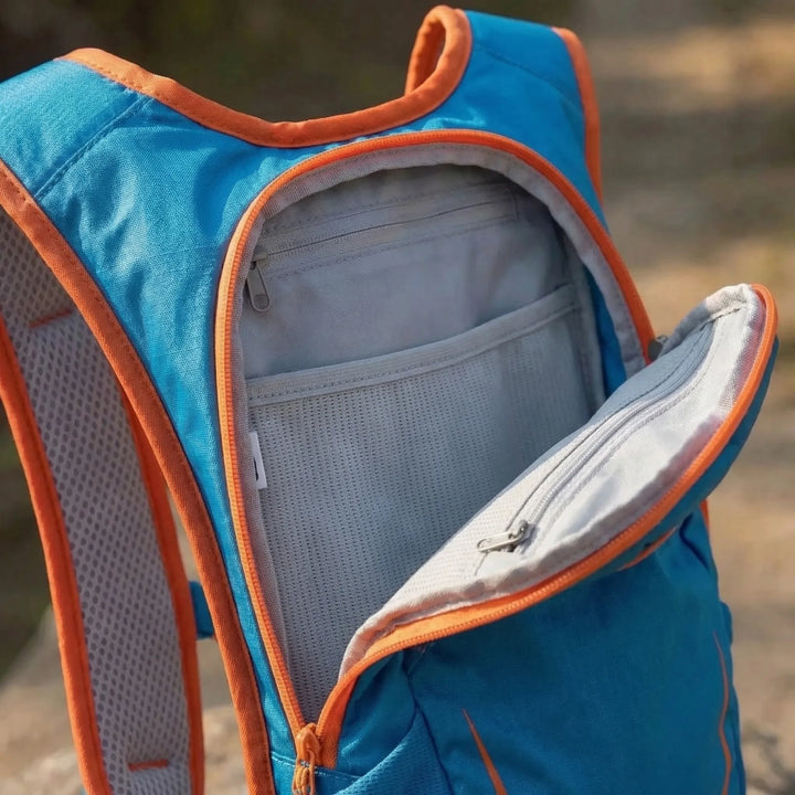Compact & lightweight 12L hydration pack for men & women. Perfect for sports, trail running, cycling.