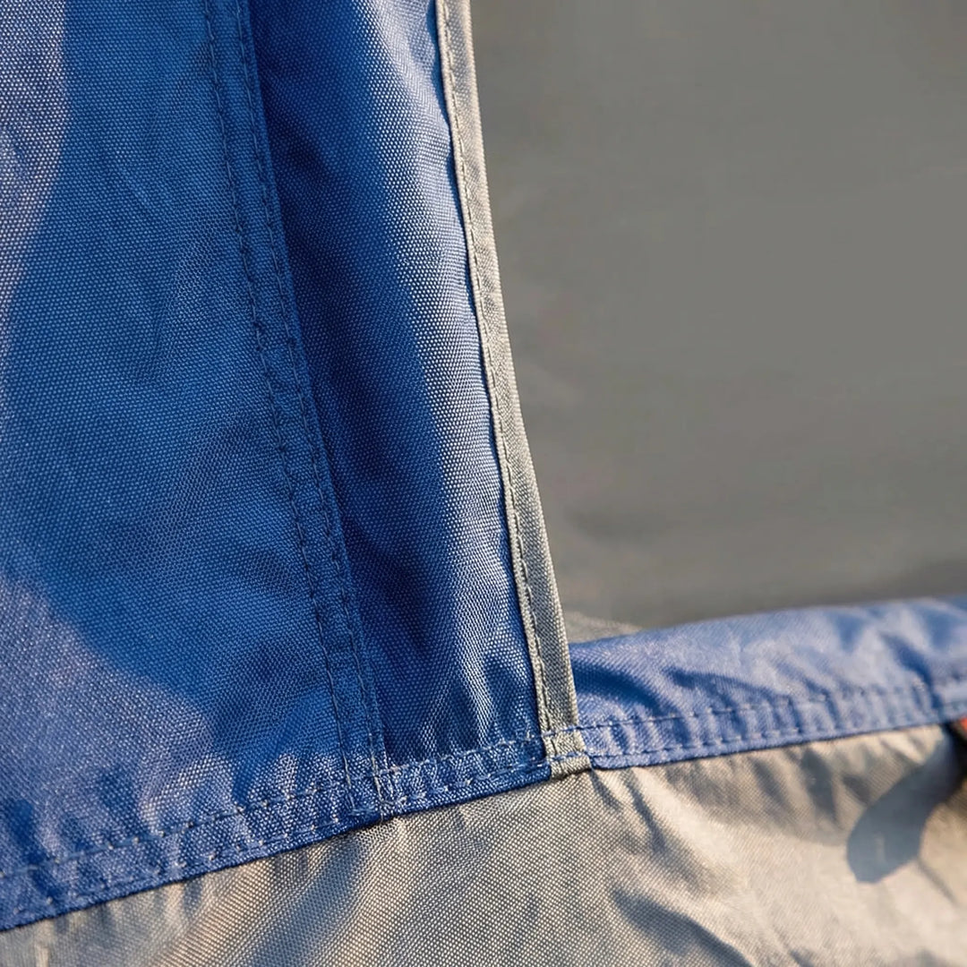 Waterproof & windproof 2-person camping tent pitched by a lake, showcasing durability for all weather conditions.
