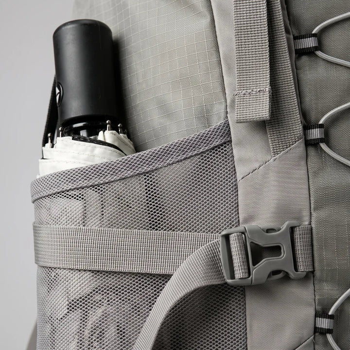 Spacious 20 Gallon unisex expedition backpack, multiple compartments for organized hiking & travel gear.