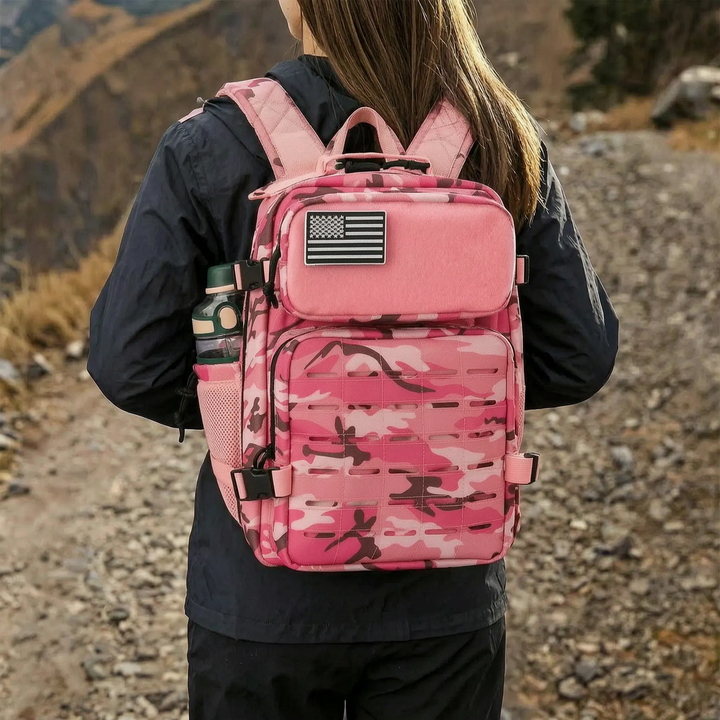 Unisex 25L tactical MOLLE backpack with laser-cut webbing, ideal for hiking, camping, and outdoor adventures.