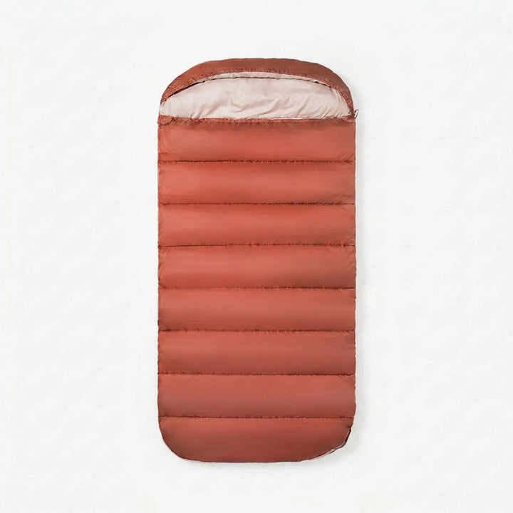 Comfortable unisex camping sleeping bag unrolled, ready for outdoor nights. Ideal lightweight gear for hiking adventures.