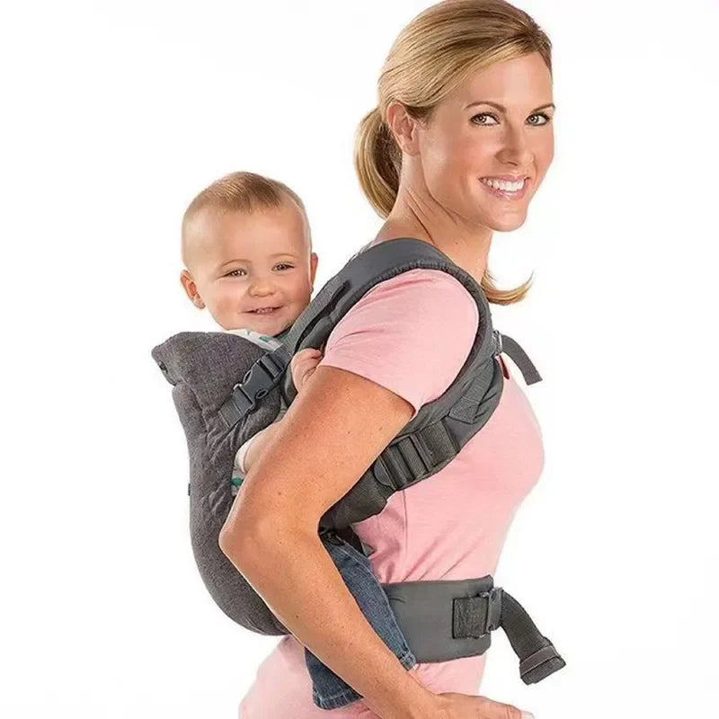 Gray ergonomic baby carrier with a detachable hood, providing sun protection for baby in the sling.