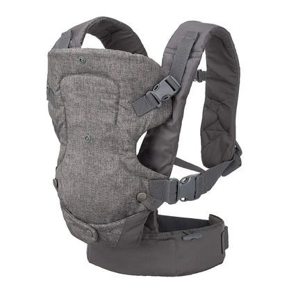 Detail of a newborn securely nestled in the gray baby sling mode of the 4-in-1 ergonomic carrier.