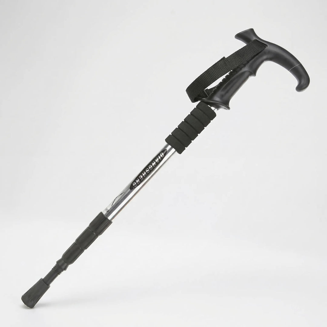 Telescopic folding trekking pole with 4 sections, providing essential trail support for any outdoor journey.