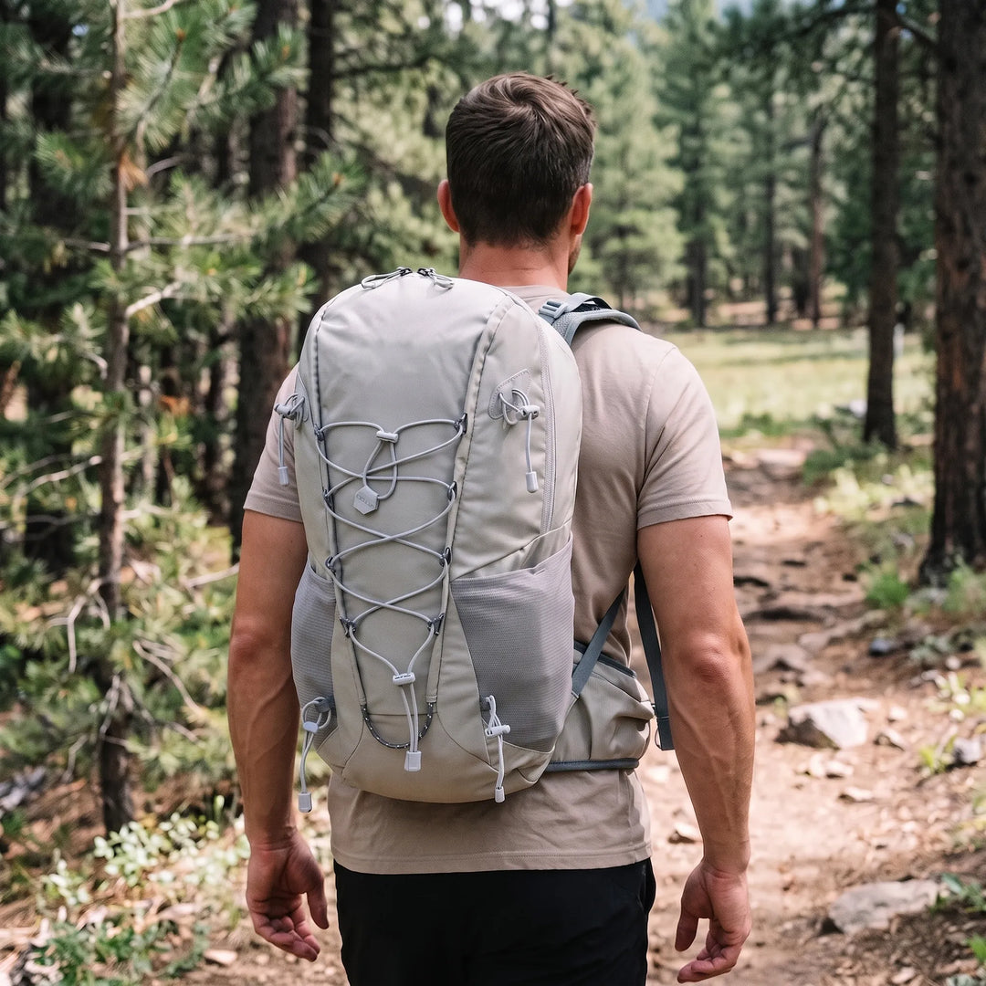 Unisex 6.6 gallon outdoor hiking daypack. Lightweight, durable backpack for camping, travel & adventure.