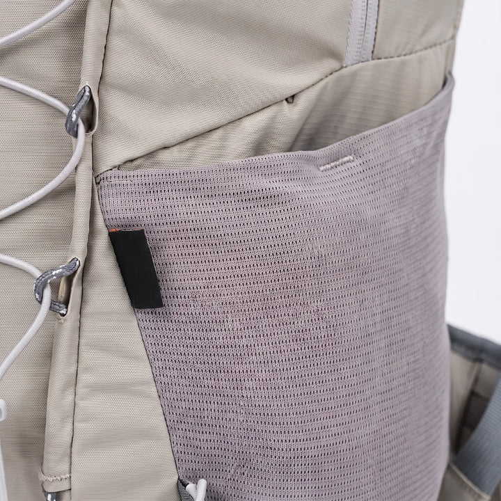 Back view of a 6.6 gallon unisex hiking backpack, ergonomic padded straps for comfortable outdoor trekking.