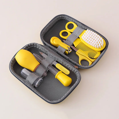Compact baby grooming kit in a portable bag, perfect for travel and newborn personal care