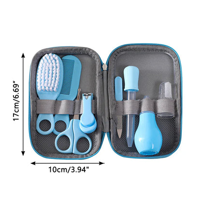 Close-up of a baby comb and soft brush from an 8-piece healthcare and grooming kit