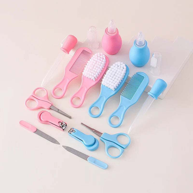 Full view of all 8 pieces in the baby grooming kit, including thermometer and finger toothbrush