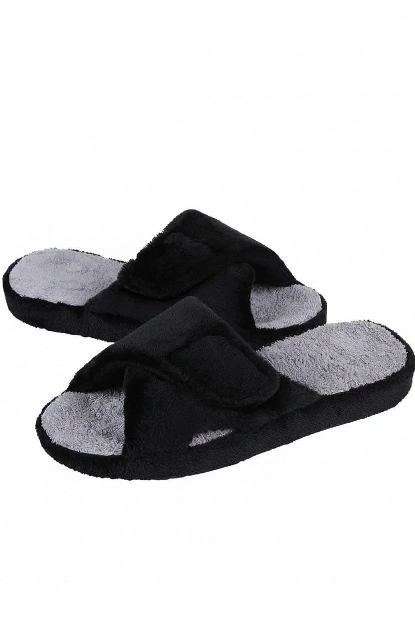 Person wearing unisex adjustable open toe comfort slippers, ideal for indoor relaxation & cushioned home wear.