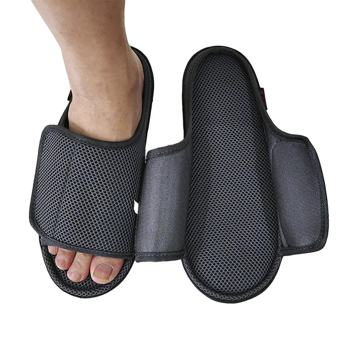 Unisex adjustable slippers for swollen & diabetic feet, wide fit with easy Velcro closure for comfort & pain relief.