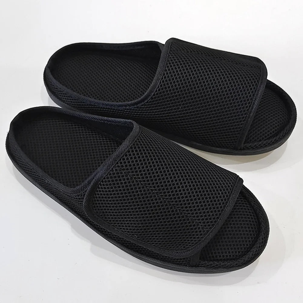 Adjustable unisex slippers with hook-and-loop closure for swollen & diabetic feet, providing custom comfort & wide fit.